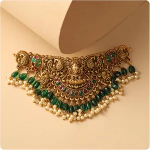 TARINIKA Indian Jewelry Set for Women Sreeja Antique Green and Red Cubic Zirconia Choker Necklace Set with Earrings, Gold Plated Brass Fashion Jewelry Gift for Women Bollywood Costume Jewellery Pearls